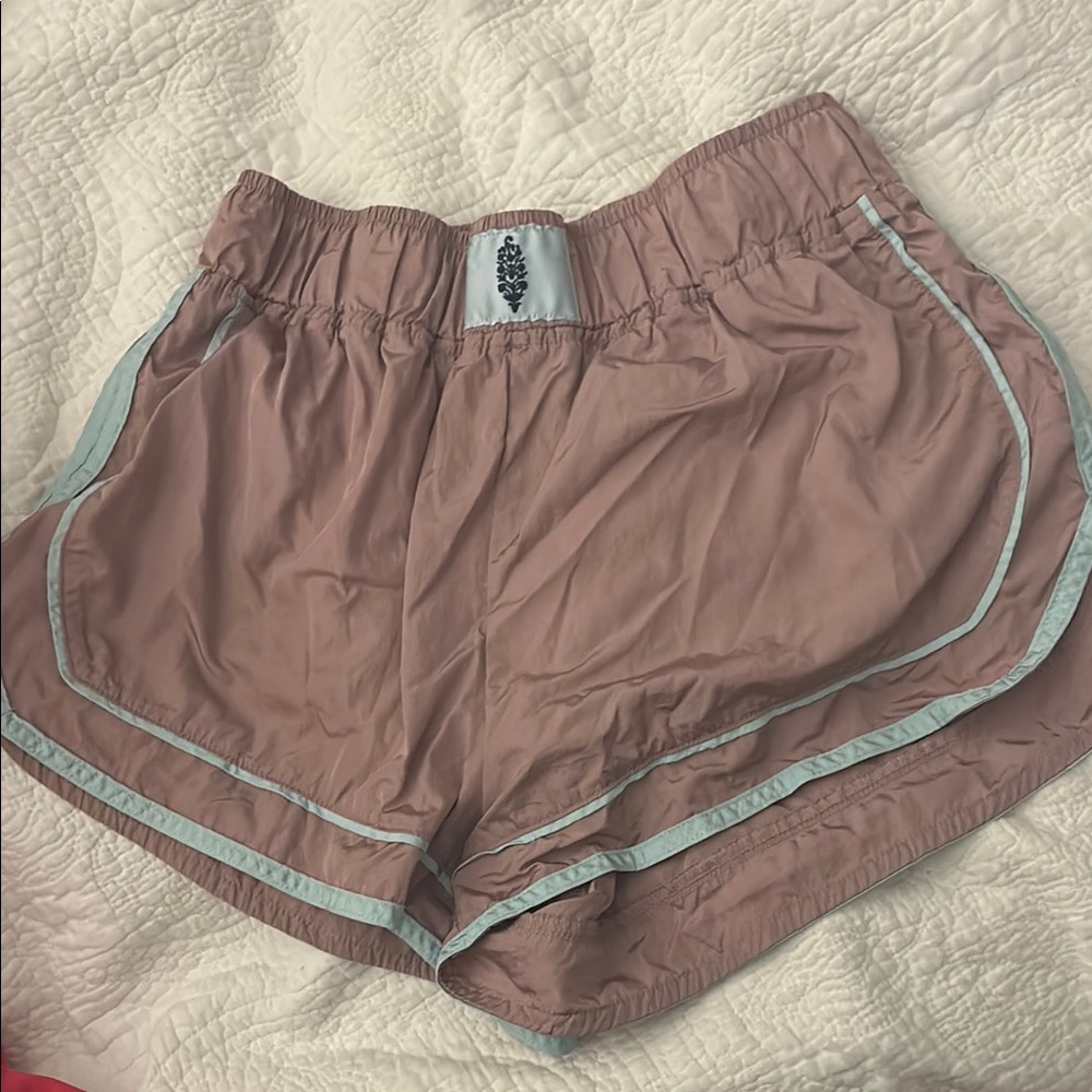 Pink Athletic Shorts with Curved Hem and Elastic Waistband